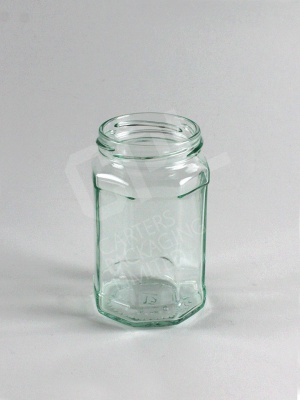 Empty glass octagonal jar